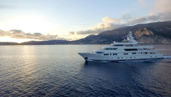 A large yacht gliding smoothly across the water